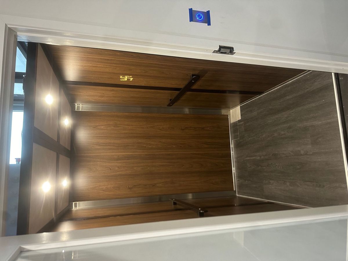 Home lift cabin with control panel