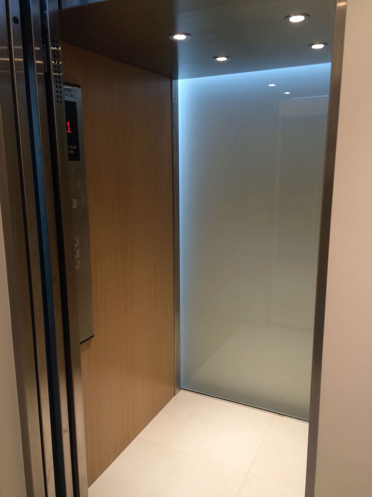 Bright glass home lift